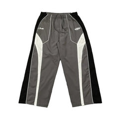 Corteiz Devil's Island sports style spliced contrasting casual pants for men and women, drawstring elastic waisted pants, trendy and versatile (1)